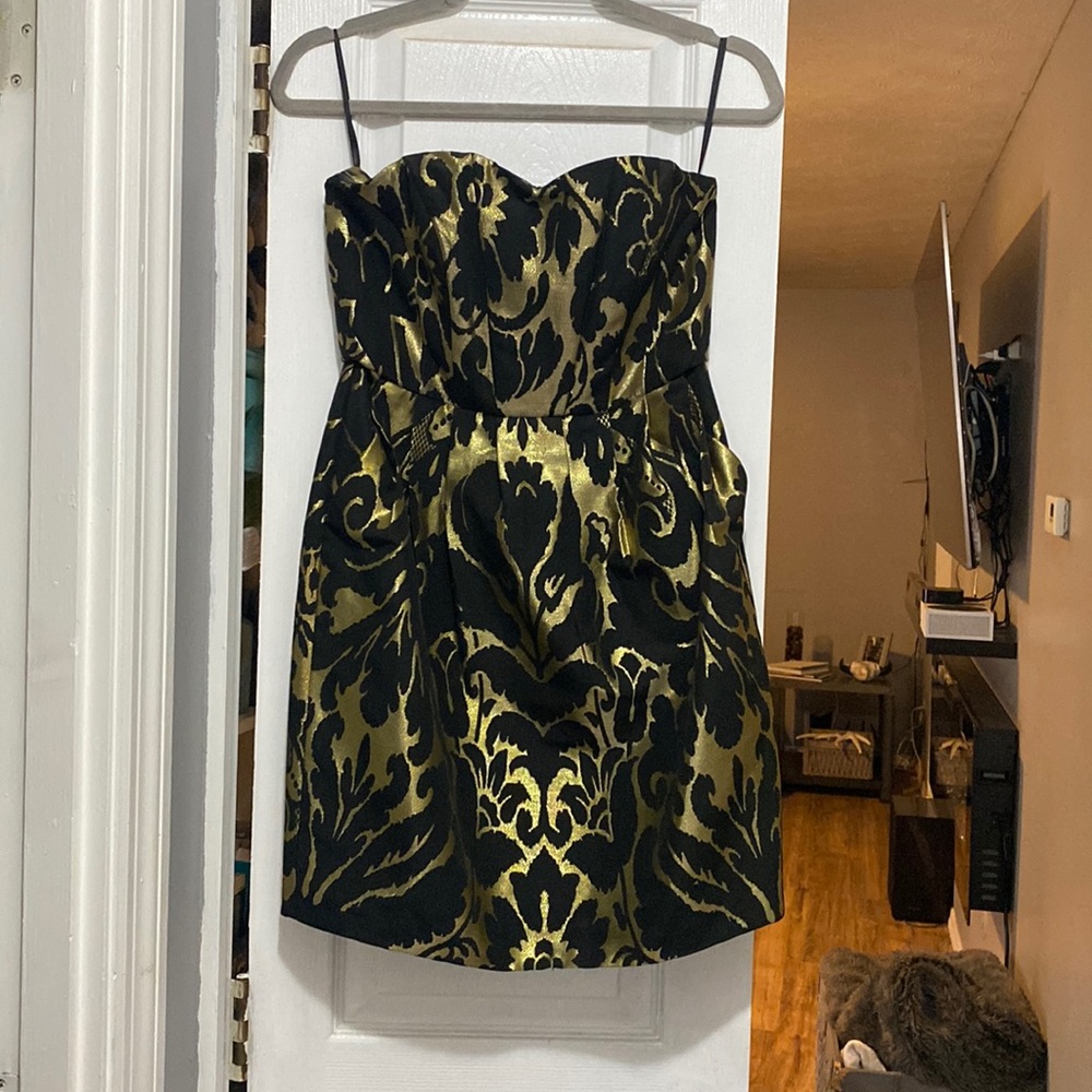 Gold and black strapless dresss